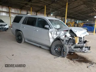 2015 Chevrolet Tahoe LS with VIN 1GNSCAEC3FR115468, listed as a Copart auction lot 47377615 with 145,897 mi miles and Salvage title. Bid and sale history available at DreamBid. Image 4.