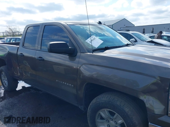 2014 Chevrolet Silverado 1500 LT with VIN 1GCRCREC6EZ413419, listed as a IAAI auction lot 41983067 with 168,011 mi miles and . Bid and sale history available at DreamBid. Image 13.