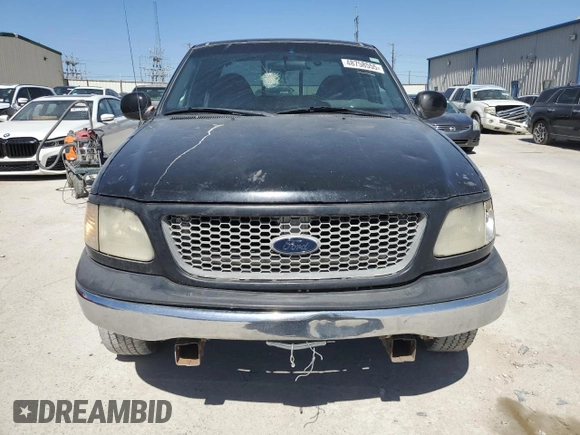 2000 Ford F-150 XL with VIN 1FTRX17L1YKA97900, listed as a Copart auction lot 48758555 with 220,834 mi miles and Clean Title. Bid and sale history available at carsss.com. Image 5.