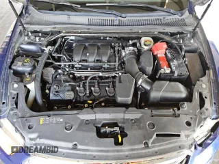 2015 Ford Taurus SEL with VIN 1FAHP2E82FG173002, listed as a Copart auction lot 76084694 with 163,626 mi miles and Clean title. Bid and sale history available at DreamBid. Image 11.