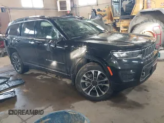 2021 Jeep Grand Cherokee Overland with VIN 1C4RJKDG8M8164904, listed as a IAAI auction lot 41352092 with 57,707 mi miles and . Bid and sale history available at DreamBid. Image 1.