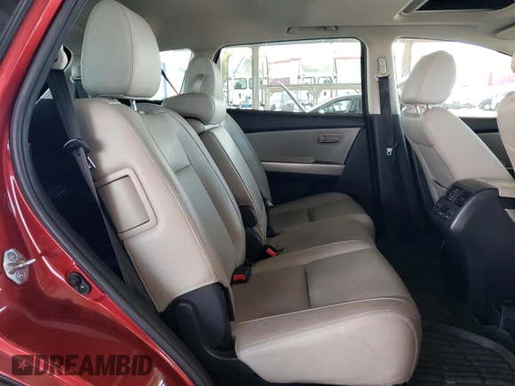 2014 Mazda CX-9 Grand Touring z VIN JM3TB2DVXE0439729, wystawiony jako Copart lot #49188875 z przebiegiem 113 839 mil mil oraz Szkoda całkowita • Salvage title. Historia ofert i sprzedaży dostępna na DreamBid. Obrazek 10.