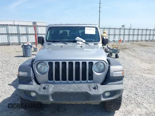 2020 Jeep Gladiator Sport S with VIN 1C6HJTAG7LL128940, listed as a IAAI auction lot 42108154 with 90,596 mi miles and . Bid and sale history available at DreamBid. Image 6.