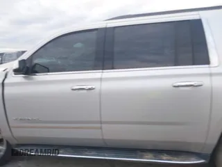 2019 GMC Yukon XL SLT with VIN 1GKS1GKC8KR383694, listed as a IAAI auction lot 41466213 with 128,368 mi miles. Bid and sale history available at carsss.com. Image 14.