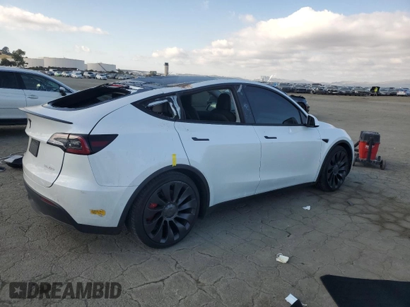 2022 Tesla Model Y Performance with VIN 7SAYGDEF1NF342071, listed as a Copart auction lot 43084905 with 30,534 mi miles and Salvage Title. Bid and sale history available at DreamBid. Image 3.