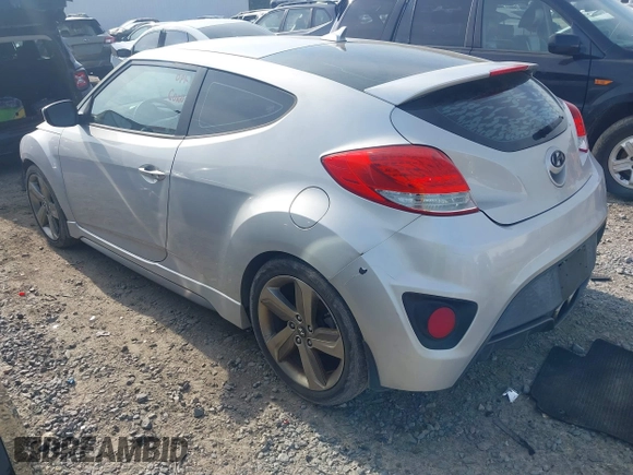 2013 Hyundai Veloster Turbo with VIN KMHTC6AE4DU157798, listed as a IAAI auction lot 42001561 with 163,370 mi miles and . Bid and sale history available at DreamBid. Image 3.