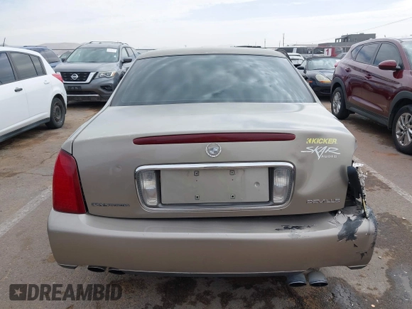 2003 Cadillac DeVille z VIN 1G6KD54Y63U223640, wystawiony jako IAAI lot #41704549 z przebiegiem 127 981 mil mil oraz . Historia ofert i sprzedaży dostępna na DreamBid. Obrazek 16.
