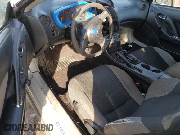 2003 Toyota Celica GT with VIN JTDDR32T130160859, listed as a Copart auction lot 77653844 with 0 mi miles and Salvage Title. Bid and sale history available at carsss.com. Image 8.