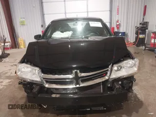 2014 Dodge Avenger SE with VIN 1C3CDZAB8EN216828, listed as a IAAI auction lot 41581761 with 177,523 mi miles. Bid and sale history available at carsss.com. Image 13.