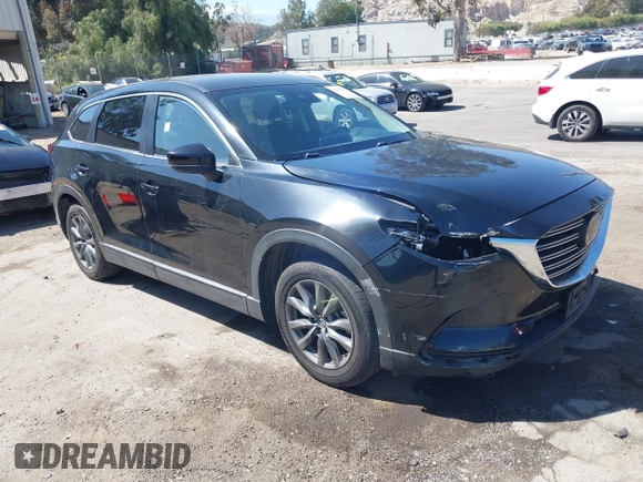 2020 Mazda CX-9 Sport with VIN JM3TCABY8L0407430, listed as a IAAI auction lot 42288490 with 50,317 mi miles and . Bid and sale history available at DreamBid. Image 1.