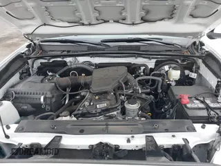 2022 Toyota Tacoma SR with VIN 3TYSX5EN1NT010664, listed as a IAAI auction lot 41642295 with 29,848 mi miles and . Bid and sale history available at DreamBid. Image 10.