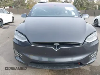 2016 Tesla Model X 70D with VIN 5YJXCAE27GF015175, listed as a IAAI auction lot 41074929 with 115,130 mi miles. Bid and sale history available at carsss.com. Image 13.