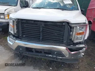2021 Ford F-150 XL with VIN 1FTFW1E82MKD23506, listed as a IAAI auction lot 41876760 with 71,387 mi miles. Bid and sale history available at carsss.com. Image 6.