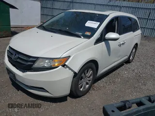 2015 Honda Odyssey EX-L with VIN 5FNRL5H64FB069742, listed as a IAAI auction lot 42101807 with 152,611 mi miles and . Bid and sale history available at DreamBid. Image 2.