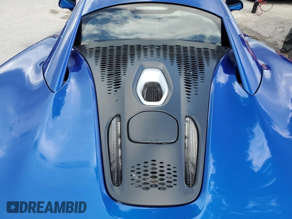 2024 McLaren Artura z VIN SBM16AEA2RW002389, wystawiony jako Copart lot #74246334 z przebiegiem 1374 mil mil oraz Nie do naprawy. Historia ofert i sprzedaży dostępna na DreamBid. Obrazek 11.