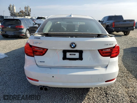 2014 BMW 3 Series 328i Gran Turismo xDrive with VIN WBA3X5C57ED242679, listed as a Copart auction lot 48598665 with 69,712 mi miles and Salvage title. Bid and sale history available at DreamBid. Image 6.