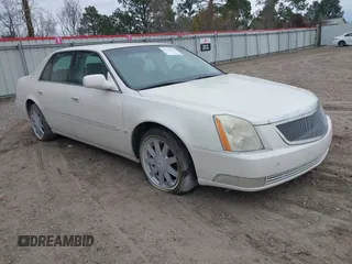 2008 Cadillac DTS w/1SD with VIN 1G6KD57Y28U200858, listed as a IAAI auction lot 41330235 with 103,446 mi miles. Bid and sale history available at carsss.com. Image 1.