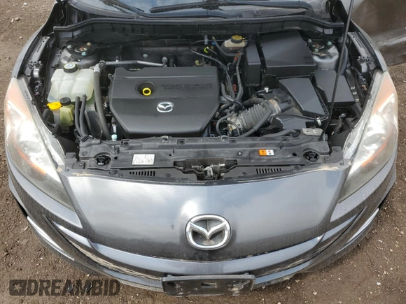 2011 Mazda 3 S Grand Touring z VIN JM1BL1M5XB1433107, wystawiony jako Copart lot #52216955 z przebiegiem 134 509 mil mil oraz Szkoda całkowita • Salvage title. Historia ofert i sprzedaży dostępna na DreamBid. Obrazek 12.