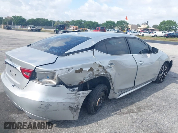 2016 Nissan Maxima SL with VIN 1N4AA6AP0GC433932, listed as a IAAI auction lot 41897180 with 91,871 mi miles and . Bid and sale history available at DreamBid. Image 6.