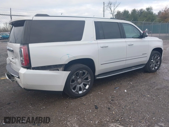 2016 GMC Yukon XL Denali with VIN 1GKS2HKJ9GR264481, listed as a IAAI auction lot 41764272 with 114,852 mi miles. Bid and sale history available at carsss.com. Image 4.