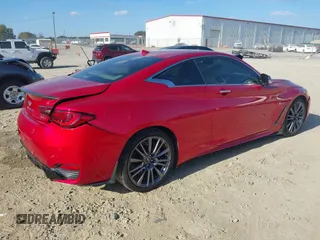 2017 Infiniti Q60 Red Sport 400 with VIN JN1FV7EK0HM610664, listed as a IAAI auction lot 40728910 with 89,817 mi miles and . Bid and sale history available at carsss.com. Image 4.