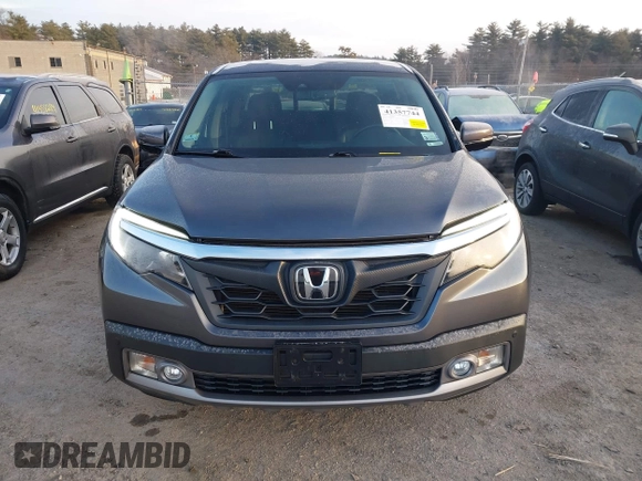 2020 Honda Ridgeline RTL-E with VIN 5FPYK3F70LB008292, listed as a IAAI auction lot 41357744 with 81,961 mi miles and . Bid and sale history available at DreamBid. Image 12.