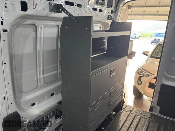 2023 Ford Transit Cargo z VIN 1FTBR1X85PKA75596, wystawiony jako IAAI lot #42742859 z przebiegiem 45 875 mil mil oraz . Historia ofert i sprzedaży dostępna na DreamBid. Obrazek 13.