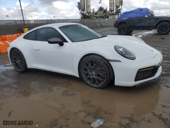 2023 Porsche 911 Carrera with VIN WP0AA2A99PS205938, listed as a Copart auction lot 48949615 with 11,636 mi miles and Salvage Title. Bid and sale history available at carsss.com. Image 4.