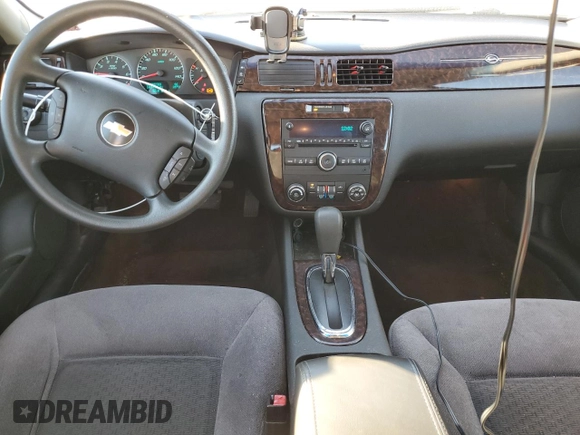 2015 Chevrolet Impala LT with VIN 2G1WB5E38F1163618, listed as a Copart auction lot 87698515 with 105,415 mi miles and Salvage Title. Bid and sale history available at DreamBid. Image 8.