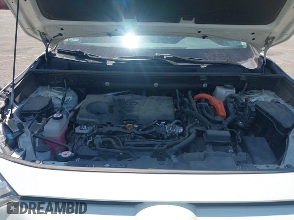 2022 Toyota RAV4 Hybrid XLE Premium z VIN 4T3B6RFVXNU079761, wystawiony jako IAAI lot #42395817 z przebiegiem 73 830 mil mil oraz . Historia ofert i sprzedaży dostępna na DreamBid. Obrazek 10.
