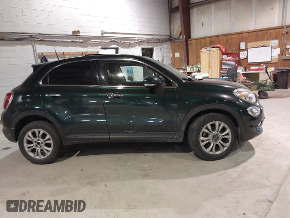 2016 FIAT 500X Lounge with VIN ZFBCFYDT1GP470721, listed as a IAAI auction lot 41293223 with 104,478 mi miles and . Bid and sale history available at DreamBid. Image 13.