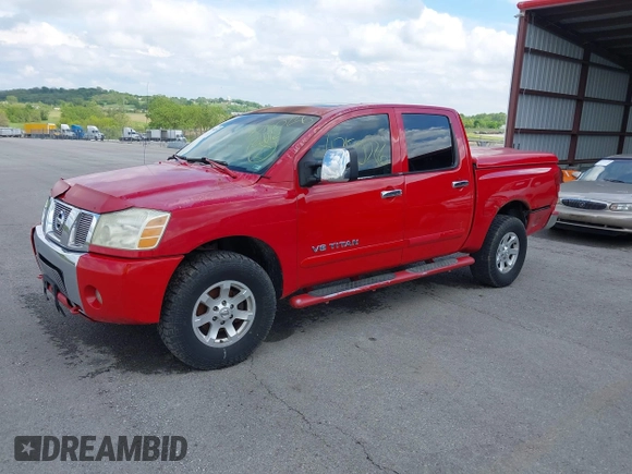 2005 Nissan Titan SE with VIN 1N6BA07B35N500027, listed as a IAAI auction lot 42150226 with 200,877 mi miles. Bid and sale history available at carsss.com. Image 2.