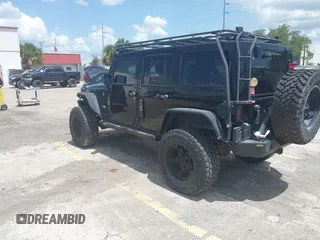 2012 Jeep Wrangler Unlimited Altitude with VIN 1C4HJWEG5CL161049, listed as a IAAI auction lot 42629330 with 217,147 mi miles and . Bid and sale history available at DreamBid. Image 3.
