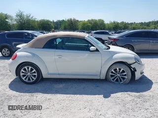 2013 Volkswagen Beetle 2.5L with VIN 3VW5P7AT3DM811617, listed as a IAAI auction lot 42055769 with 93,810 mi miles and . Bid and sale history available at DreamBid. Image 13.
