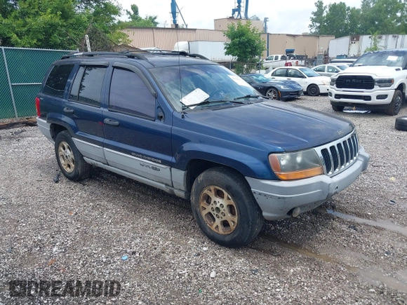 2000 Jeep Grand Cherokee Laredo z VIN 1J4GW48S9YC338947, wystawiony jako IAAI lot #42545830 z przebiegiem 234 251 mil mil oraz . Historia ofert i sprzedaży dostępna na DreamBid. Obrazek 1.