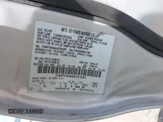 2006 Ford Taurus SE with VIN 1FAFP53U66A101635, listed as a IAAI auction lot 42067998 with 208,734 mi miles. Bid and sale history available at carsss.com. Image 9.