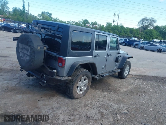 2014 Jeep Wrangler Unlimited Sport with VIN 1C4BJWDG6EL194359, listed as a IAAI auction lot 42182236 with 134,889 mi miles and . Bid and sale history available at DreamBid. Image 4.