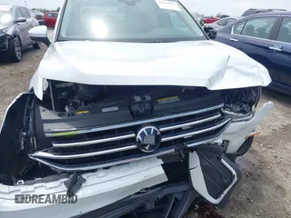 2022 Volkswagen Tiguan SE with VIN 3VV3B7AX3NM176770, listed as a IAAI auction lot 42114378 with 37,448 mi miles and . Bid and sale history available at DreamBid. Image 19.