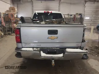 2014 Chevrolet Silverado 1500 LT with VIN 1GCVKREC1EZ343636, listed as a IAAI auction lot 41477466 with 142,194 mi miles. Bid and sale history available at carsss.com. Image 16.