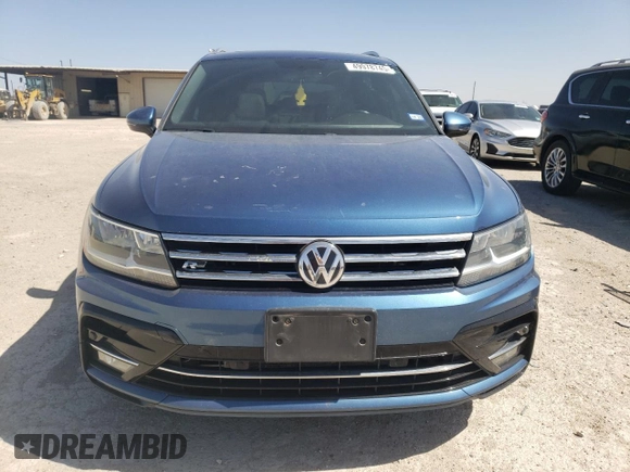 2019 Volkswagen Tiguan SE with VIN 3VV3B7AX4KM061848, listed as a Copart auction lot 49978745 with 100,295 mi miles and Salvage Title. Bid and sale history available at DreamBid. Image 5.