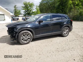 2017 Mazda CX-9 Touring z VIN JM3TCBCY6H0141997, wystawiony jako Copart lot #57513295 z przebiegiem Nie podano mil oraz Szkoda całkowita • Salvage title. Historia ofert i sprzedaży dostępna na DreamBid. Obrazek 1.