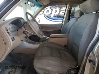 2001 Ford Explorer Sport Trac with VIN 1FMZU77E61UB89698, listed as a Copart auction lot 63945285 with 219,524 mi miles and Clean title. Bid and sale history available at DreamBid. Image 7.