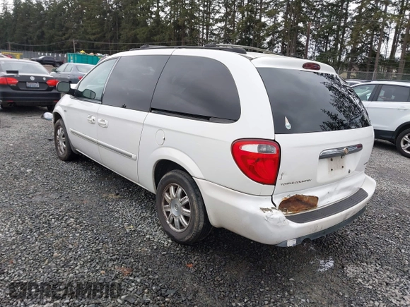 2005 Chrysler Town & Country Touring with VIN 2C4GP54L25R395372, listed as a IAAI auction lot 41805284 with 143,431 mi miles. Bid and sale history available at carsss.com. Image 3.