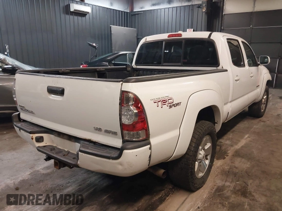 2009 Toyota Tacoma with VIN 5TEMU52N89Z620734, listed as a IAAI auction lot 41365825 with 336,070 mi miles and . Bid and sale history available at DreamBid. Image 4.