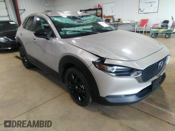 2024 Mazda CX-30 2.5 S Select Sport with VIN 3MVDMBBM0RM658069, listed as a IAAI auction lot 42130803 with 26,714 mi miles. Bid and sale history available at carsss.com. Image 1.
