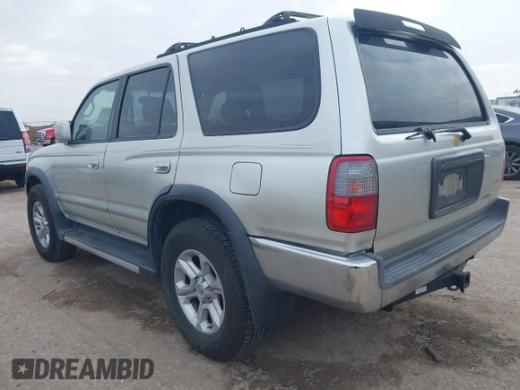 1999 Toyota 4Runner SR5 z VIN JT3GN86R1X0123115, wystawiony jako IAAI lot #41505478 z przebiegiem 173 141 mil mil oraz . Historia ofert i sprzedaży dostępna na DreamBid. Obrazek 3.