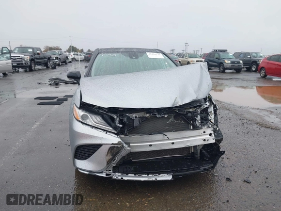 2020 Toyota Camry XSE with VIN 4T1K61AK1LU318098, listed as a IAAI auction lot 41097712 with 64,118 mi miles and . Bid and sale history available at DreamBid. Image 13.