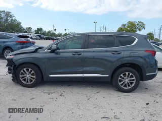 2019 Hyundai Santa Fe SE with VIN 5NMS23AD9KH037136, listed as a IAAI auction lot 41744001 with 150,745 mi miles. Bid and sale history available at carsss.com. Image 15.