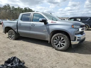 2021 Chevrolet Silverado 1500 LT with VIN 3GCUYDET4MG154765, listed as a Copart auction lot 48231225 with 99,353 mi miles and Salvage Title. Bid and sale history available at carsss.com. Image 4.