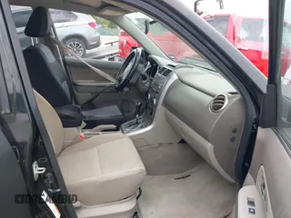 2010 Suzuki Grand Vitara Premium z VIN JS3TE0D22A4101157, wystawiony jako IAAI lot #42231953 z przebiegiem 187 737 mil mil oraz . Historia ofert i sprzedaży dostępna na DreamBid. Obrazek 5.
